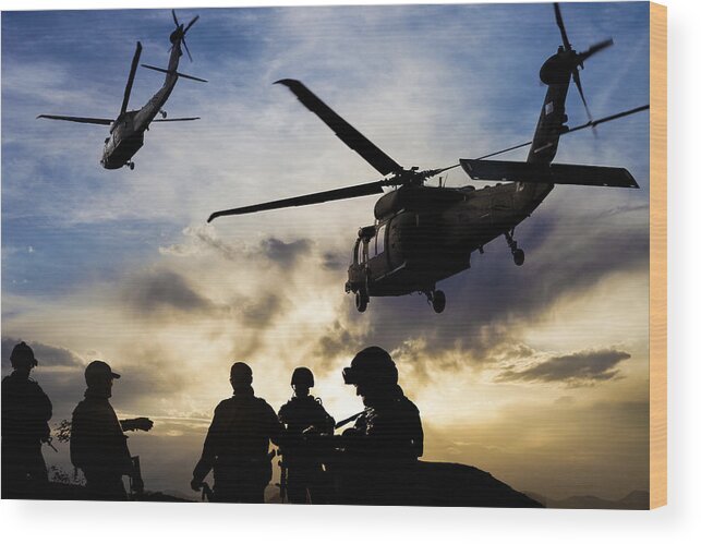 People Wood Print featuring the photograph Silhouettes of soldiers during Military Mission at dusk by Guvendemir