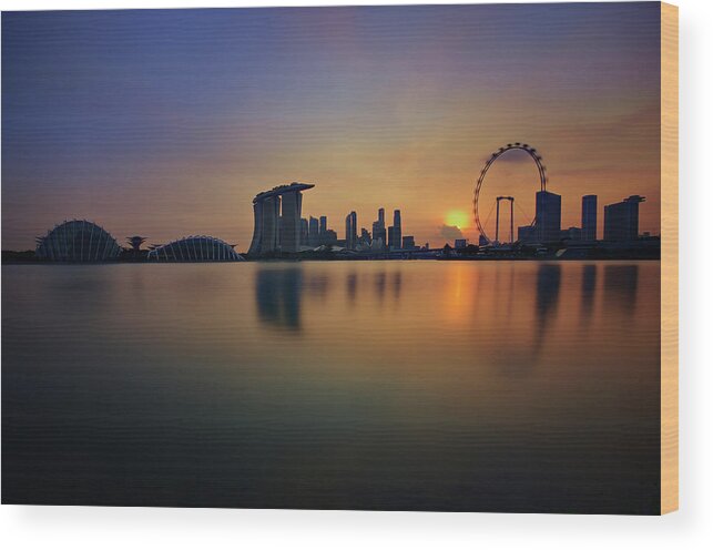 Tranquility Wood Print featuring the photograph Singapore Skyline Sunset by © Copyright Kengoh8888