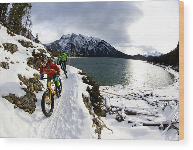Heterosexual Couple Wood Print featuring the photograph Snow Biking Couple by GibsonPictures