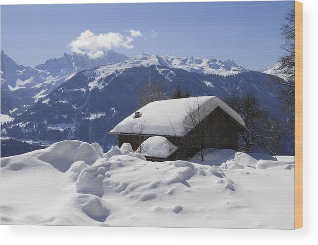 Winter Wood Print featuring the photograph Snow-covered house in the mountains in winter by Matthias Hauser