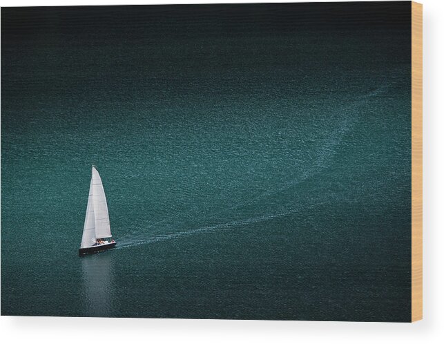 Scenics Wood Print featuring the photograph Solo Yacht Cruises On Lake At St. Moritz by Charles Briscoe-knight