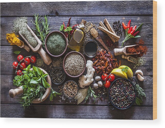 Mortar And Pestle Wood Print featuring the photograph Spices and herbs on rustic wood kitchen table by Fcafotodigital