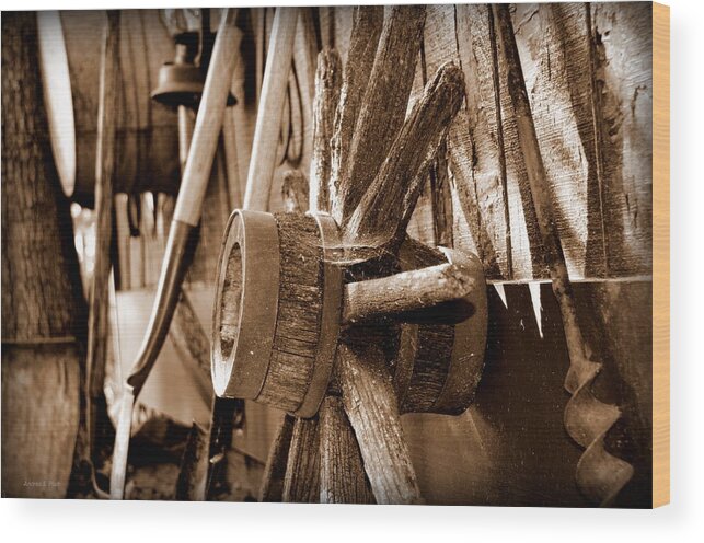 Wagon Wheel Wood Print featuring the photograph Still Here by Andrea Platt