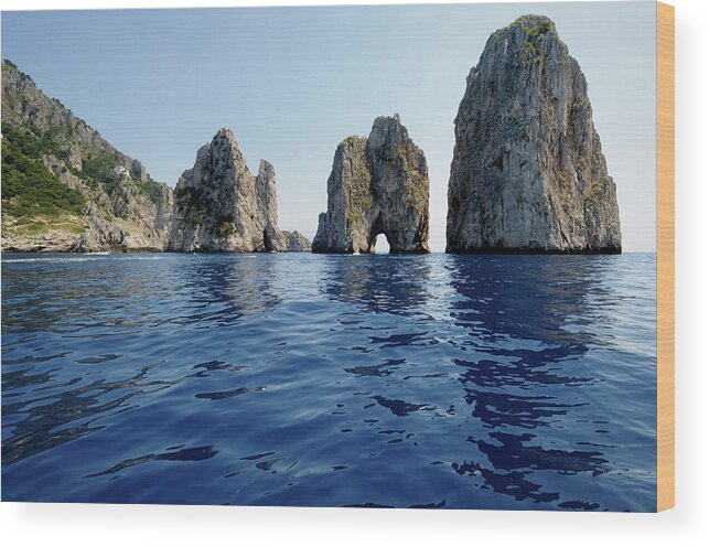 Tyrrhenian Sea Wood Print featuring the photograph Stones Of Capri Island From Italy by Aureliangogonea