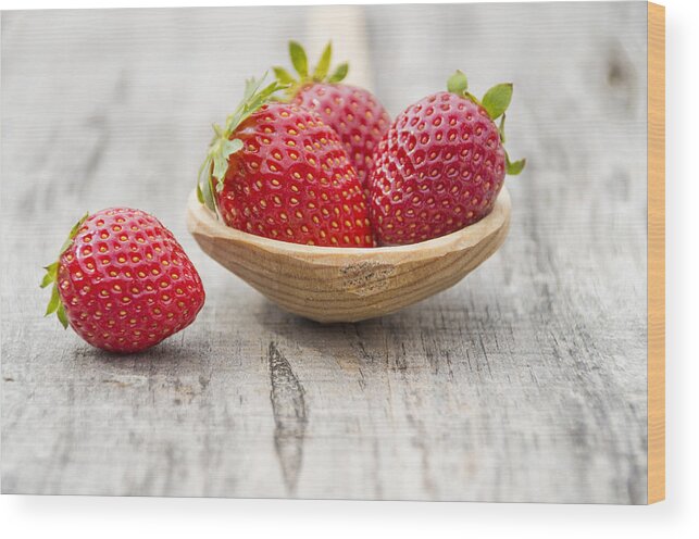 Berry Wood Print featuring the photograph Strawberries in a wooden spoon by Paulo Goncalves