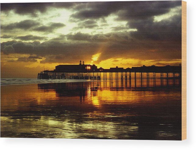 Hastings Pier Wood Print featuring the photograph Sunset at Hastings Pier UK by Maggie Mccall