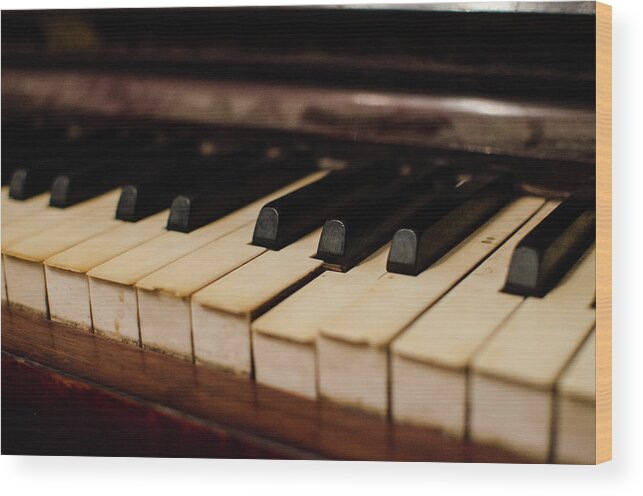 Piano Wood Print featuring the photograph Timeworn Piano Keys by Megan Ahrens