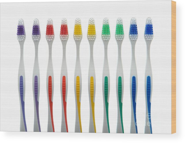 Toothbrush Wood Print featuring the photograph Toothbrushes by Olivier Le Queinec