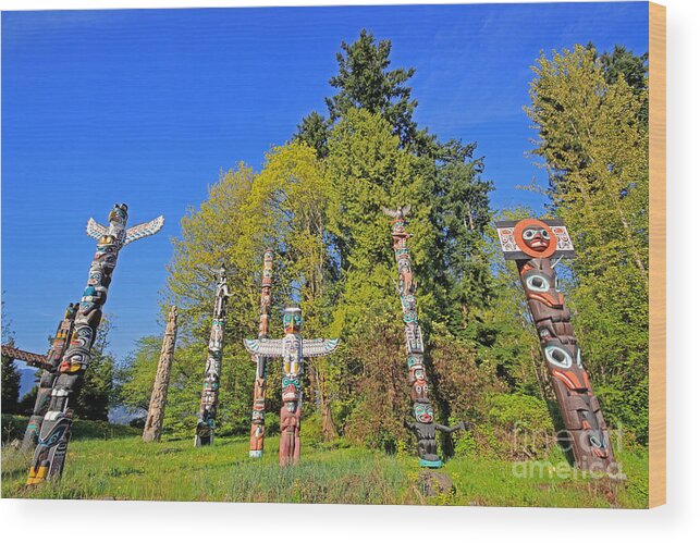 Vacouver Wood Print featuring the photograph Totem Poles in Stanley Park by Charline Xia