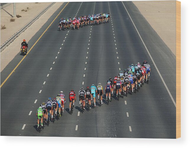 Peloton Wood Print featuring the photograph Tour of Qatar - Stage One by Bryn Lennon