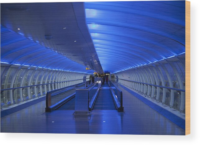 Arch Wood Print featuring the photograph Travelator, moving walkway, blue lighting by Onfilm