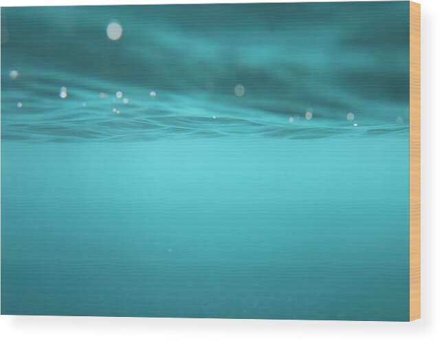Tranquility Wood Print featuring the photograph Underwater view on blue surface of water by Stanislaw Pytel