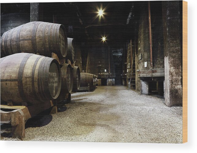 Desaturated Wood Print featuring the photograph Vintage Porto Wine Cellar by Vuk8691
