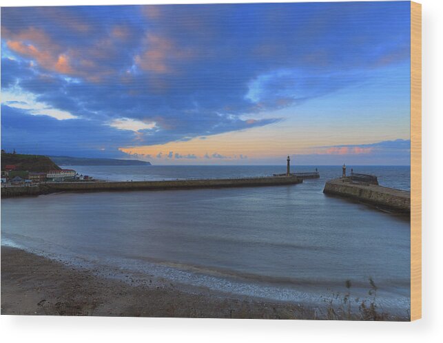 Water's Edge Wood Print featuring the photograph Whitby Harbour Entrance At Sunset by Louise Heusinkveld