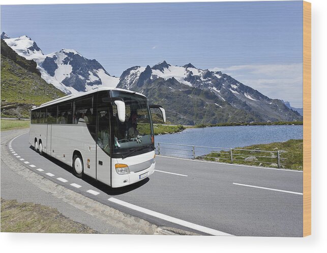 Land Vehicle Wood Print featuring the photograph White bus crossing the alpes by Grafissimo
