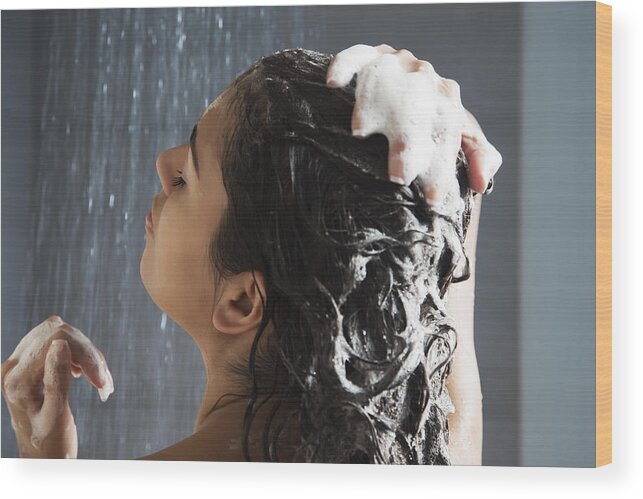 Shower Wood Print featuring the photograph Woman washing her hair in shower by PhotoAlto/Frederic Cirou