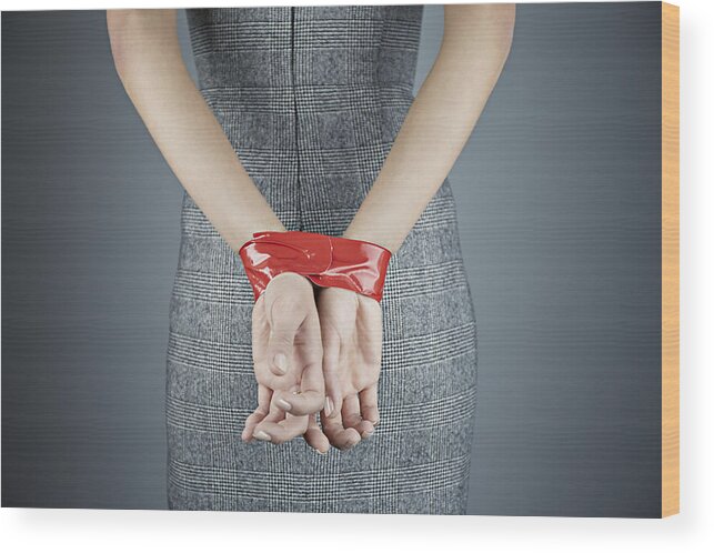 Corporate Business Wood Print featuring the photograph Woman with hands tied behind back by Compassionate Eye Foundation