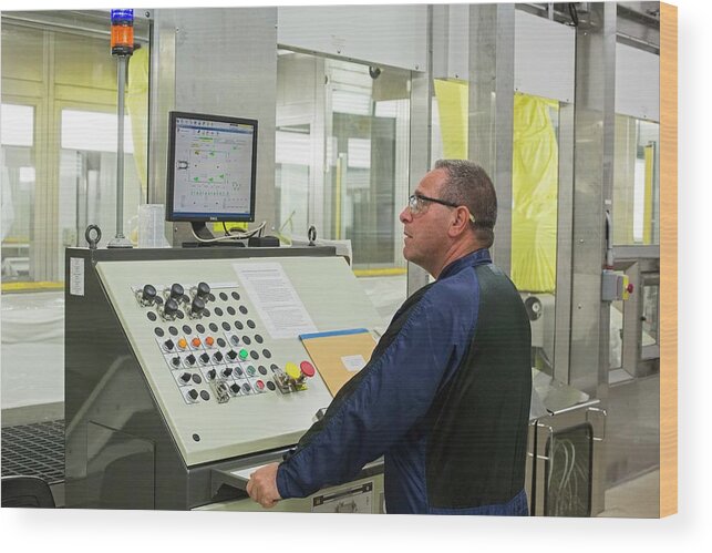 2014 Wood Print featuring the photograph Worker At Car Assembly Line Control Panel by Jim West