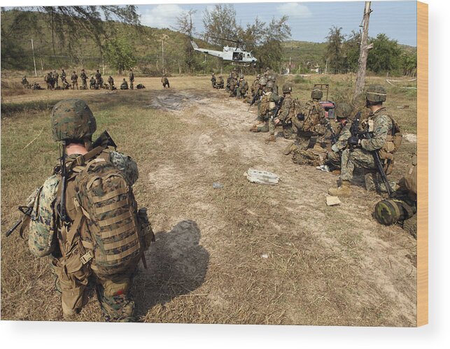 Marine Expeditionary Unit Wood Print featuring the photograph U.s. Marines Provide Security #1 by Stocktrek Images