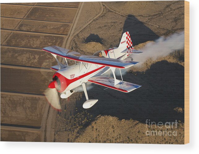 Transportation Wood Print featuring the photograph A Pitts Model 12 Aircraft In Flight by Scott Germain
