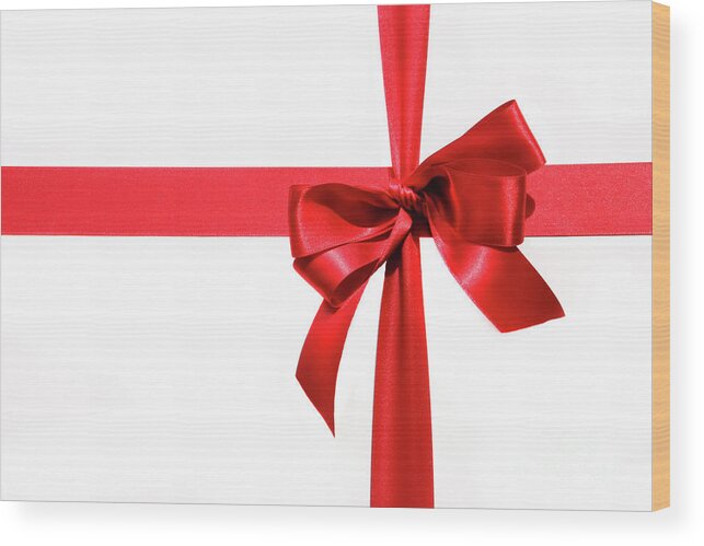 Anniversary Wood Print featuring the photograph Big red holiday bow on white by Sandra Cunningham