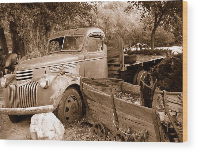 Broken Down Flatbed Wood Truck Vintage Rusted Busted Farming Equipment Rocks Ogden Utah Wood Print featuring the photograph Broken by Holly Blunkall