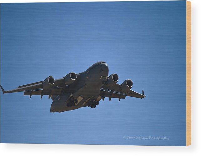 C-17 Wood Print featuring the photograph C-17 in Flight by Dorothy Cunningham