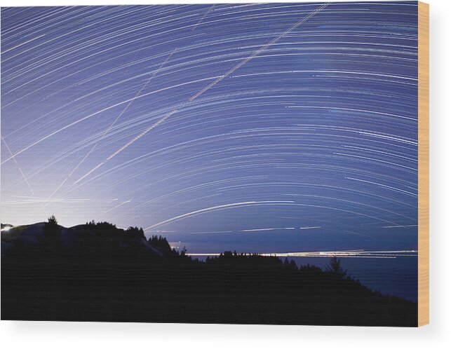 00499816 Wood Print featuring the photograph Light Trails From Planes Boats And Star by Sebastian Kennerknecht