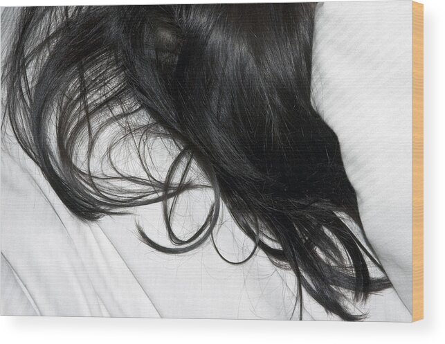 Hair Wood Print featuring the photograph Long dark hair of a woman on white pillow by Matthias Hauser