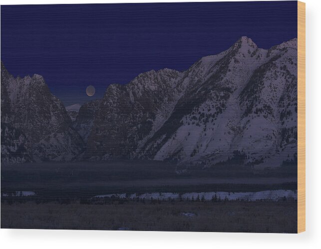 Lunar Eclipse Wood Print featuring the photograph Lunar Eclipse Grand Teton National Park by Benjamin Dahl