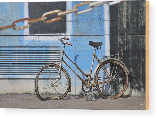Bicycle Wood Print featuring the photograph Old and broken bicycle left alone by Matthias Hauser