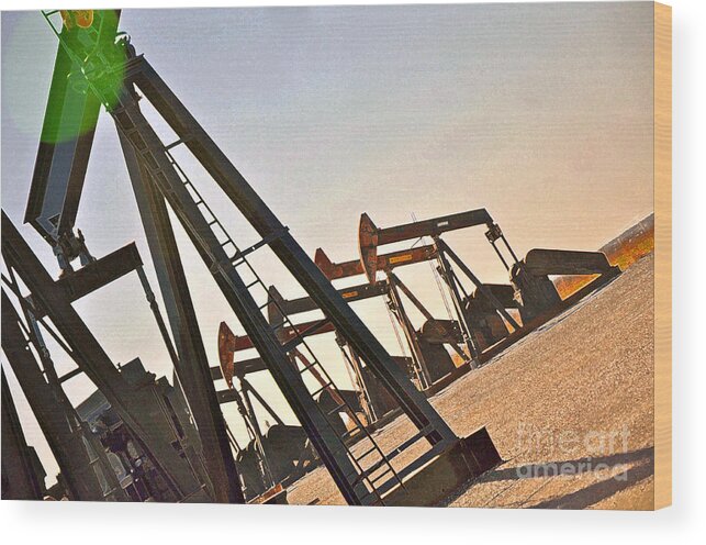 Pumpjack Wood Print featuring the photograph Pumps in a Row by Anjanette Douglas