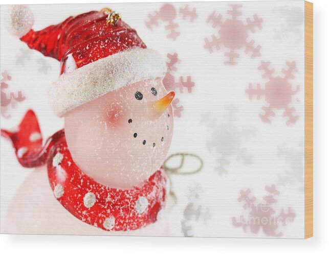 Background Wood Print featuring the photograph Snowman with snowflakes by Simon Bratt