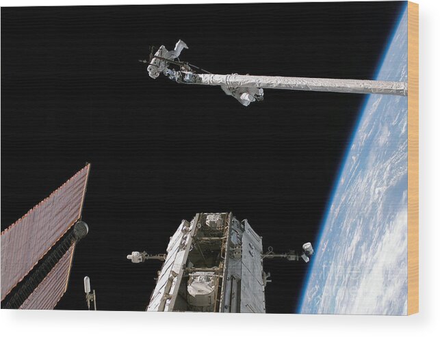 Canadarm Wood Print featuring the photograph Sts-121 Robotic Arm by Nasa