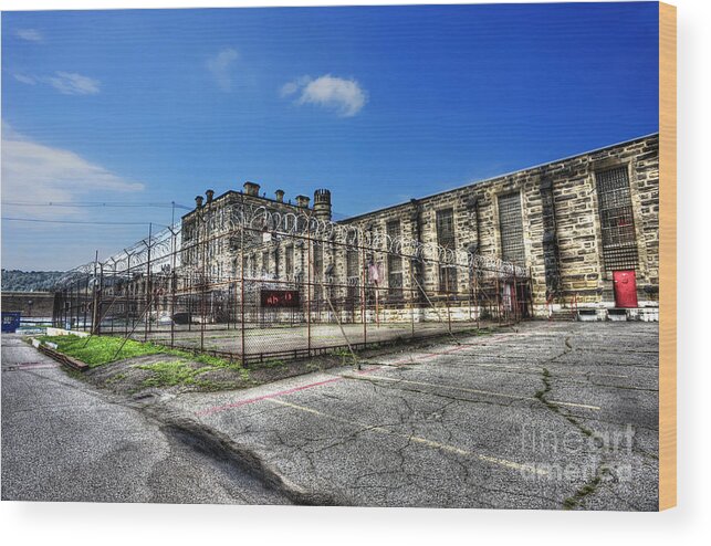  West Virginia State Penitentiary Wood Print featuring the photograph The West Virginia State Penitentiary courtyard outside by Dan Friend