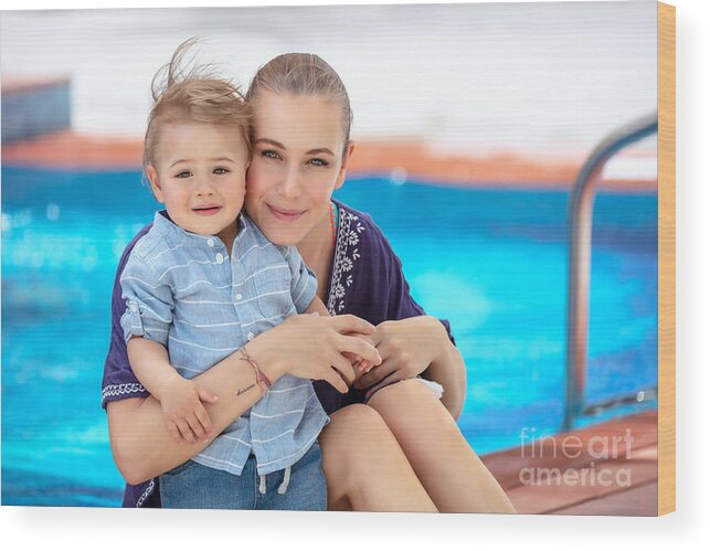 Activity Wood Print featuring the photograph Baby boy with mom on the beach resort #1 by Anna Om