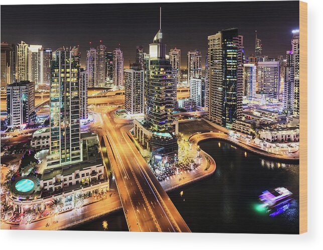 Dubai Wood Print featuring the photograph Dubai Marina at night #1 by Alexey Stiop