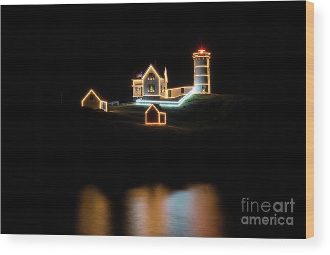 Nubble Lighthouse Wood Print featuring the photograph Nubble Lighthouse - Christmas in July #1 by Craig Shaknis