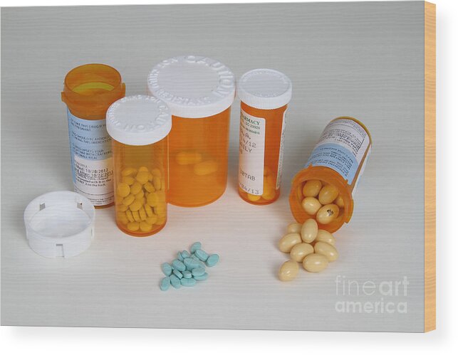 2 Mg Wood Print featuring the photograph Progesterone 200mg And Estradiol 2mg #1 by Photo Researchers, Inc.
