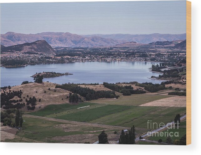 High Angle View Wood Print featuring the photograph Sunset over Lake Wanaka in New Zealand #1 by Didier Marti