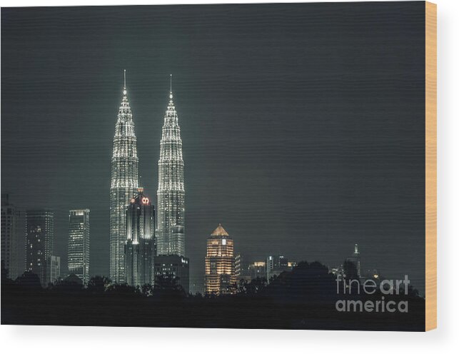 Twin Tower Wood Print featuring the photograph Twin Towers #1 by Charuhas Images