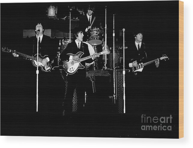 Beatles Wood Print featuring the photograph Beatles In Concert 1964 by Larry Mulvehill