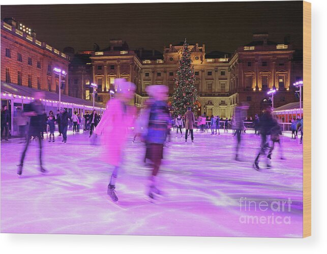 Ice Skating At Somerset House London Skate Rink Motion Night Wood Print featuring the photograph Ice Skating at Somerset House London #2 by Julia Gavin