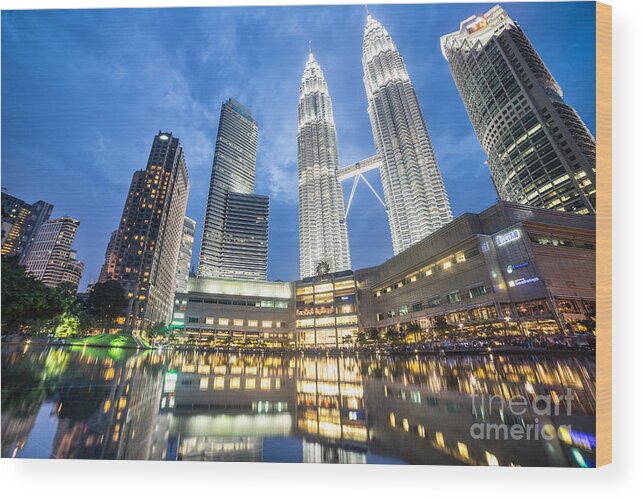 Klcc Wood Print featuring the photograph Kuala Lumpur Petronas towers #4 by Didier Marti