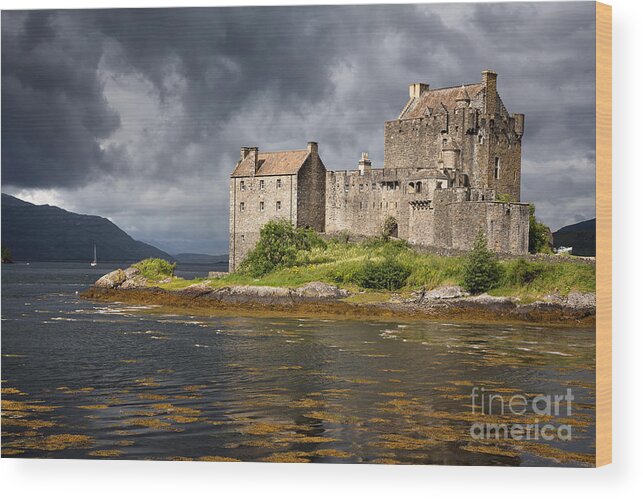 Castle Wood Print featuring the photograph A storm brews over Eilean Donan Castle by Jane Rix