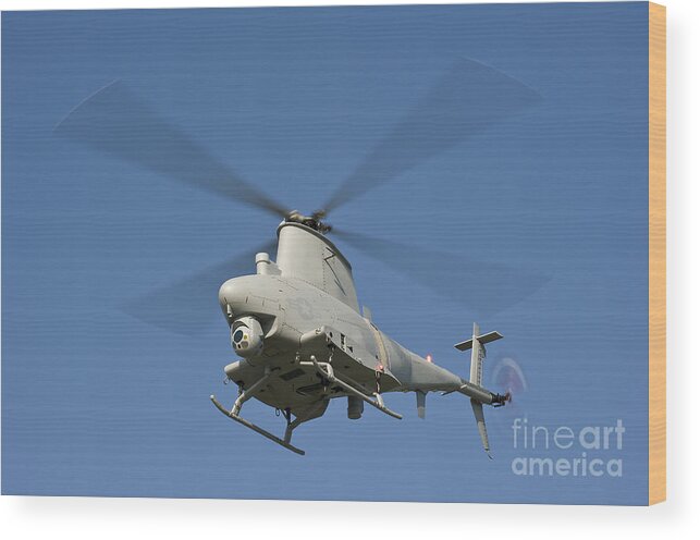 Mq-8 Fire Scout Wood Print featuring the photograph An Mq-8b Fire Scout Unmanned Aerial by Stocktrek Images