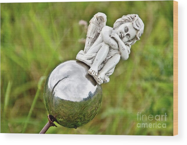 Photograph Wood Print featuring the photograph Angel on her Silver Ball by Adriana Zoon