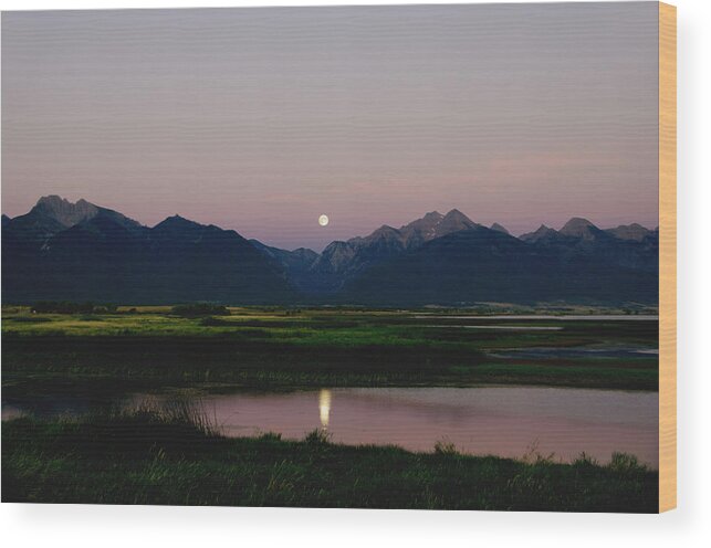 Full Moon Wood Print featuring the photograph August Moon over Mission Mountains and Ninepipes Refuge by Larry Kjorvestad