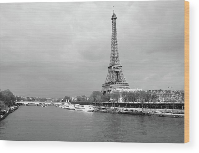 Eiffel Tower Wood Print featuring the photograph Boats Along the Seine River Left and Right Banks with Eiffel Tower Paris France Black and White by Shawn O'Brien