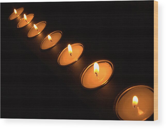 Candle Wood Print featuring the photograph Candles in a row by Alexander Fedin